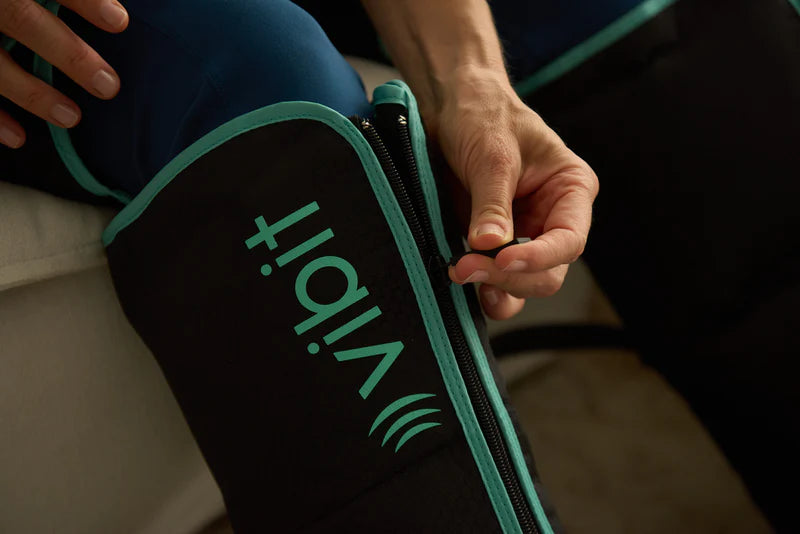 Close-up of zipping the FlowBoots up the calf