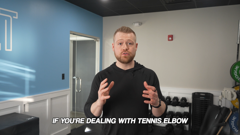 dr explaining tennis elbow relief